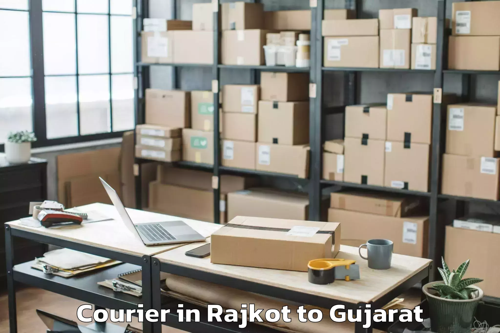 Book Your Rajkot to Kheralu Courier Today